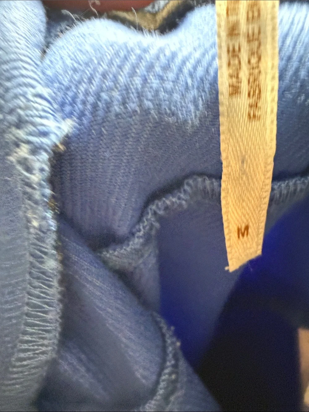 Free People Real Deal Slit Flare pants w/vibrant blue color distinct hem slits.